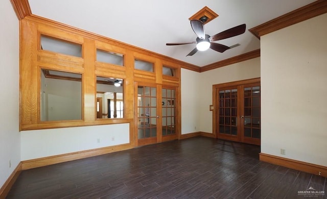 unfurnished room featuring ornamental molding, dark wood-type flooring, ceiling fan, and french doors