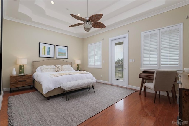 107 E Palm St Unit A, South Padre Island, TX 78597 - bedroom with a tray ceiling, access to exterior, ornamental molding, wood finished floors, and ceiling fan