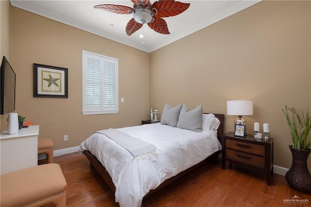107 E Palm St Unit A, South Padre Island, TX 78597 - bedroom featuring baseboards, wood finished floors, ornamental molding, and ceiling fan