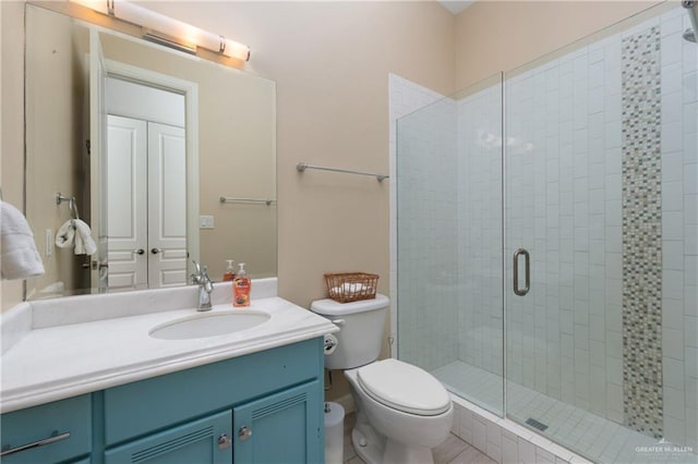 107 E Palm St Unit A, South Padre Island, TX 78597 - bathroom featuring vanity, toilet, and a shower stall