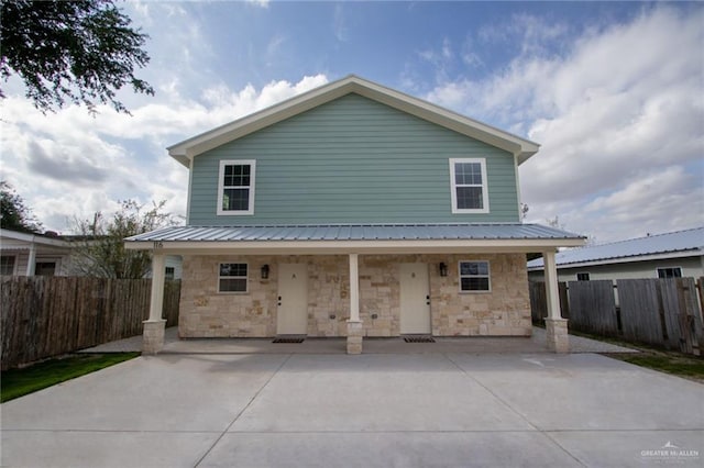 rear view of property with a patio