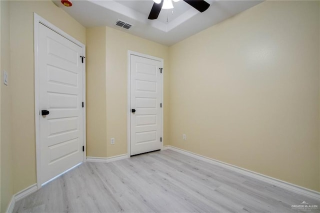 unfurnished room featuring ceiling fan and light wood-type flooring