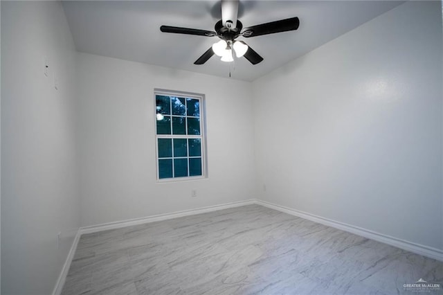 unfurnished room with ceiling fan