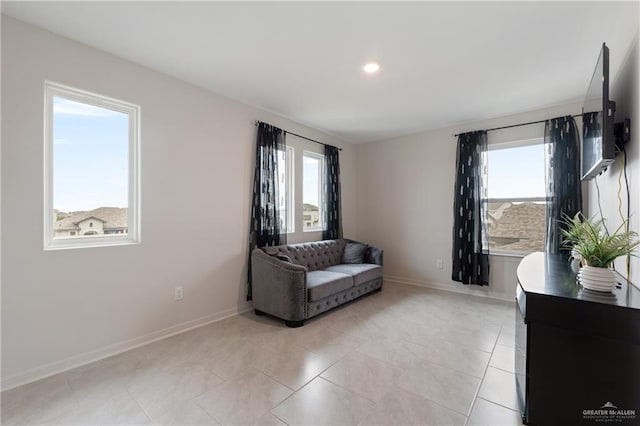 sitting room featuring light tile patterned flooring