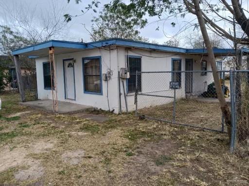 exterior space with a fenced front yard