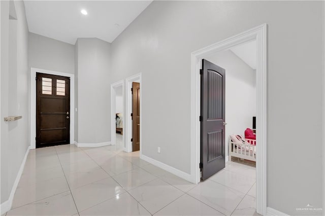 foyer with a towering ceiling