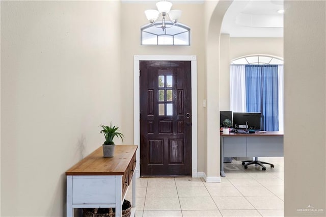 foyer featuring light tile patterned floors