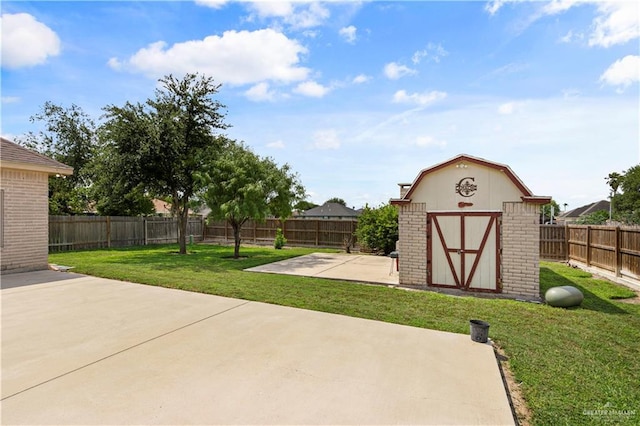 1800 E 24th St, Mission, TX 78574 - view of patio with an outbuilding, a shed, and a fenced backyard