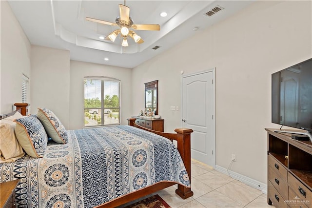 1800 E 24th St, Mission, TX 78574 - bedroom featuring light tile patterned floors, a tray ceiling, recessed lighting, and visible vents