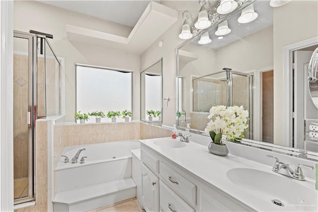 1800 E 24th St, Mission, TX 78574 - full bathroom with a garden tub, a sink, double vanity, and a shower stall