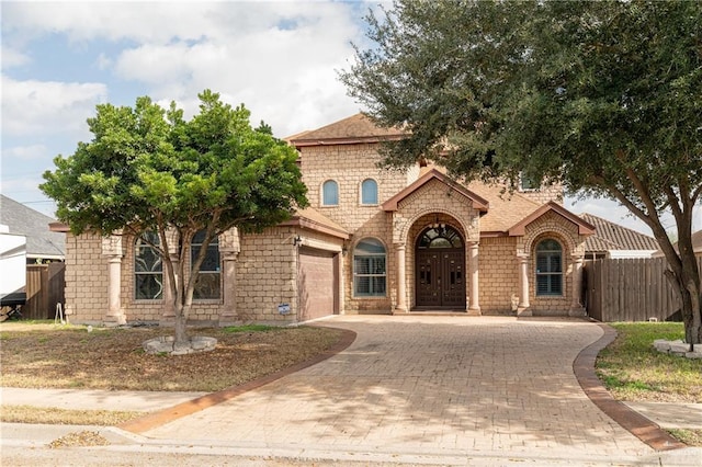 view of front of property with a garage