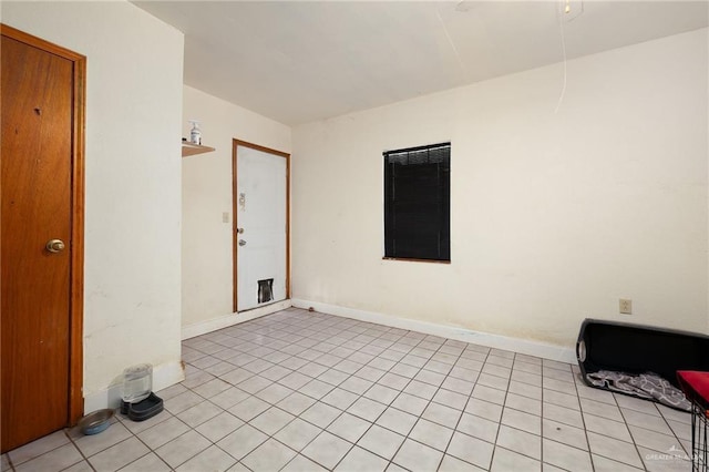2403 Silver Oak Ave, Mission, TX 78574 - empty room with baseboards and light tile patterned flooring