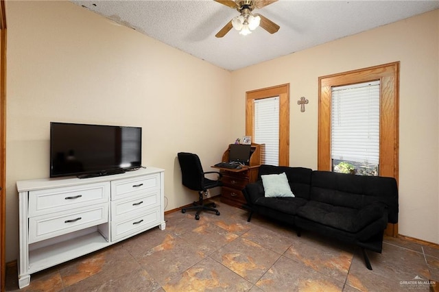 2403 Silver Oak Ave, Mission, TX 78574 - office space with baseboards, a ceiling fan, and stone finish floor
