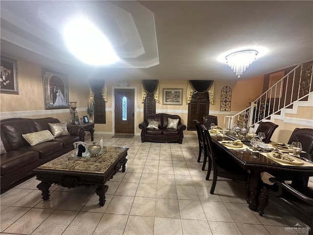 living room featuring an inviting chandelier