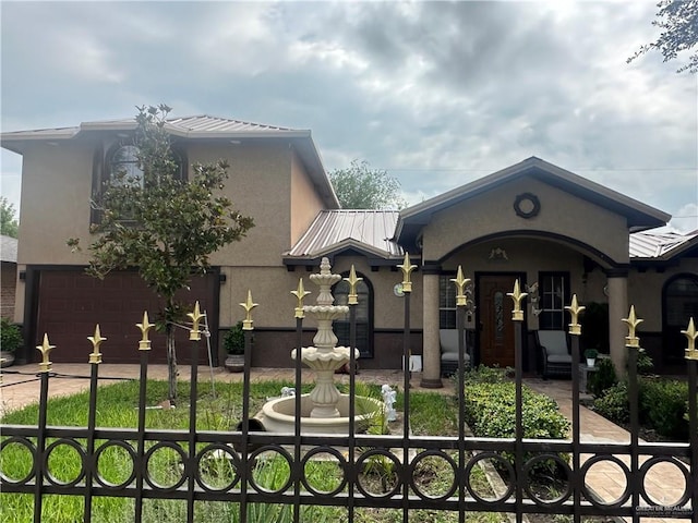 view of front of home featuring a garage