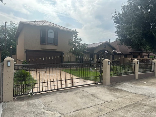 view of gate featuring a garage