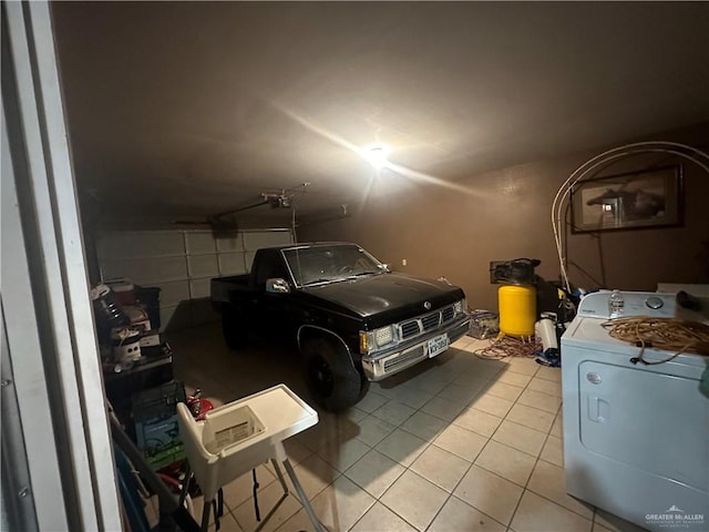 garage featuring washer and dryer