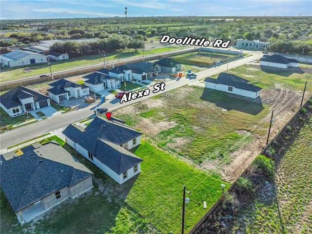 drone / aerial view with a residential view