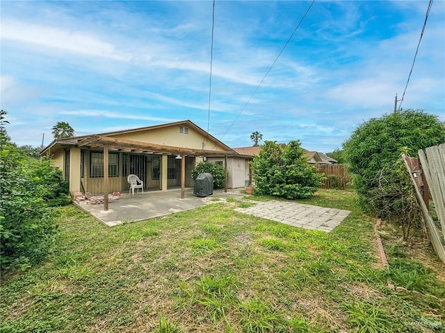 2417 W Iris Ave, Mcallen, TX 78501 - back of property featuring a patio area