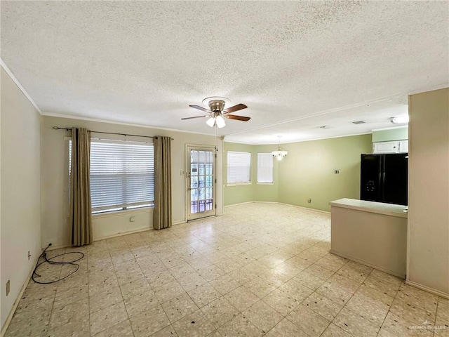 2417 W Iris Ave, Mcallen, TX 78501 - spare room featuring crown molding, a ceiling fan, a chandelier, a textured ceiling, and baseboards