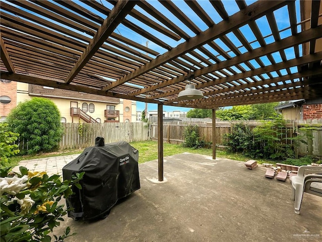 2417 W Iris Ave, Mcallen, TX 78501 - fenced backyard featuring a patio, a grill, and a pergola