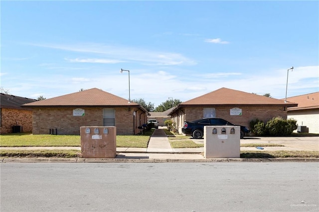 exterior space with a front lawn