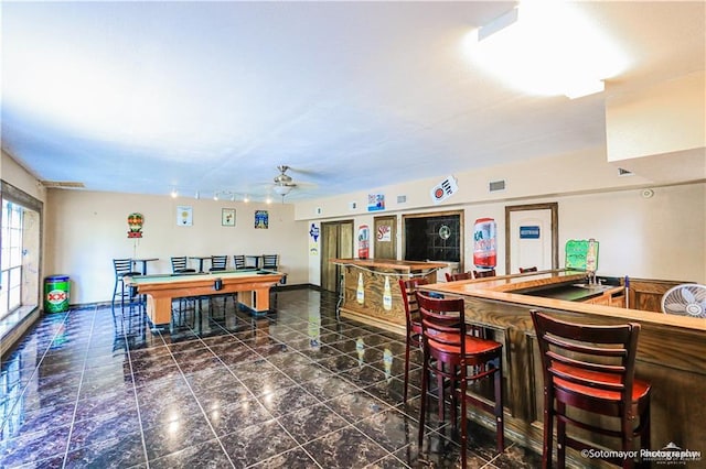 kitchen featuring ceiling fan and billiards