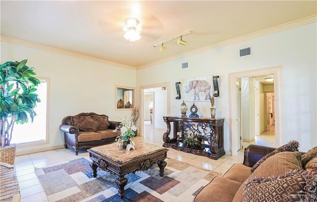 living room featuring light tile patterned floors, track lighting, ceiling fan, and ornamental molding