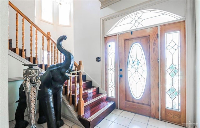 tiled foyer entrance with plenty of natural light