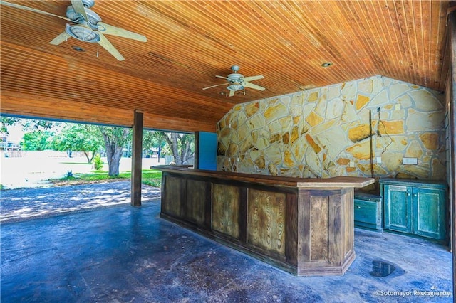 interior space with wood ceiling and lofted ceiling