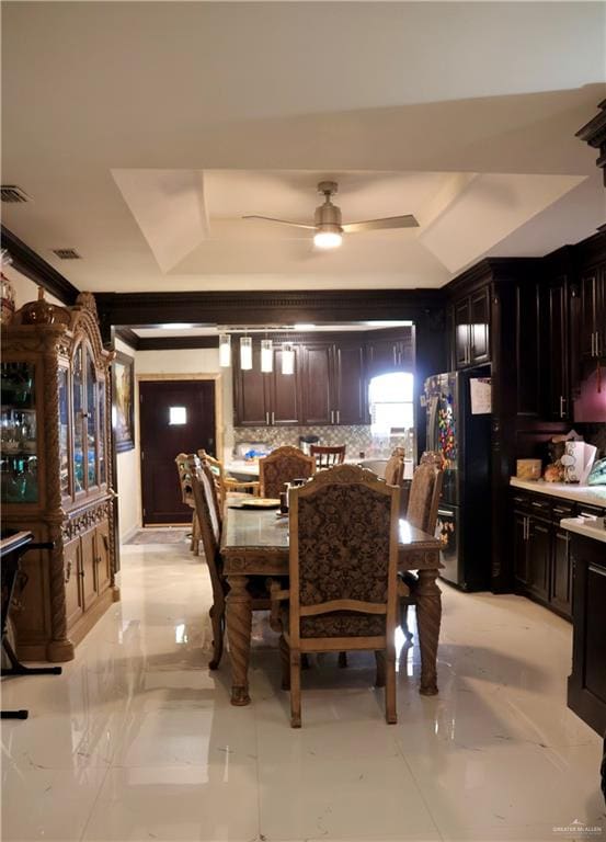 dining area featuring ceiling fan