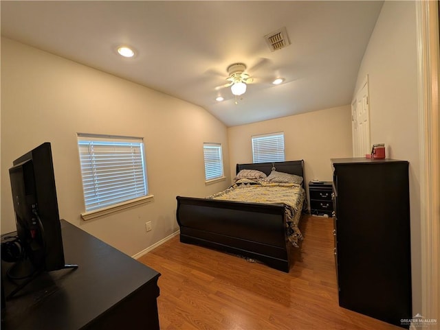106 Resaca Shores Dr S, Los Fresnos, TX 78566 - bedroom featuring wood finished floors, vaulted ceiling, baseboards, ceiling fan, and recessed lighting