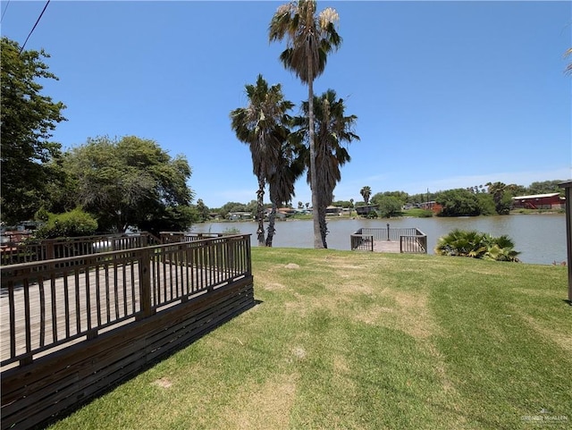 106 Resaca Shores Dr S, Los Fresnos, TX 78566 - view of green lawn featuring a water view