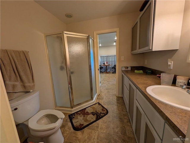106 Resaca Shores Dr S, Los Fresnos, TX 78566 - bathroom with a shower stall, vanity, and toilet