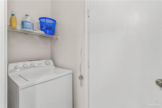 laundry room featuring washer / dryer