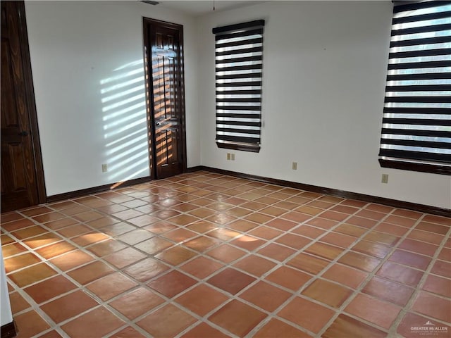 view of tiled spare room