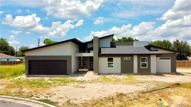 3724 E Diamondhead Ave, Alton, TX 78573 - view of front of property with an attached garage and stucco siding