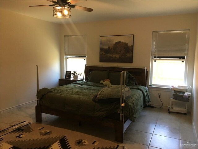 7507 55th Ln, Mcallen, TX 78504 - tiled bedroom featuring baseboards and ceiling fan