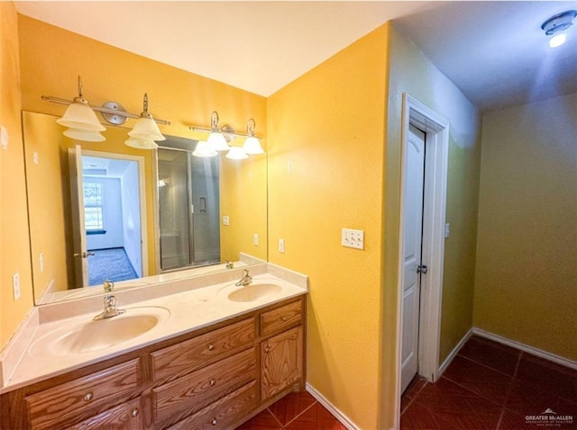 bathroom featuring tile patterned flooring and vanity