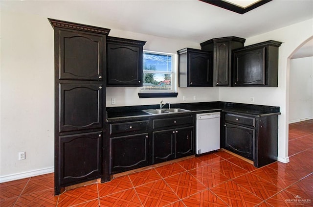 kitchen with white dishwasher and sink