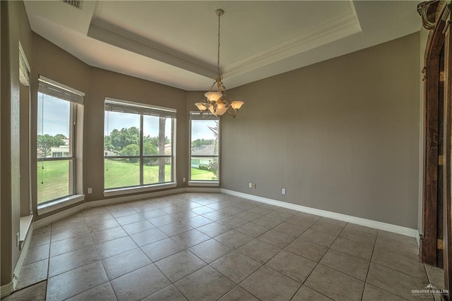 tiled empty room with a raised ceiling, crown molding, and an inviting chandelier