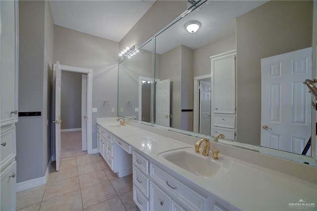 bathroom with vanity and tile patterned floors