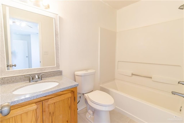 full bathroom with tile patterned flooring, shower / tub combination, vanity, and toilet