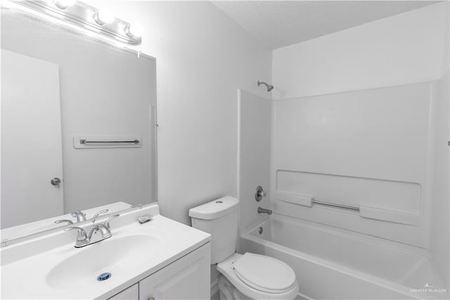 full bathroom featuring shower / tub combination, vanity, a textured ceiling, and toilet