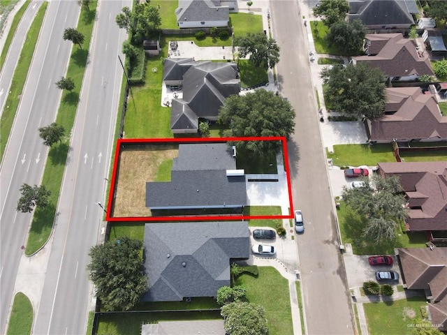 1915 Chandler Cir, Edinburg, TX 78542 - aerial perspective of suburban area featuring property parcel outlined