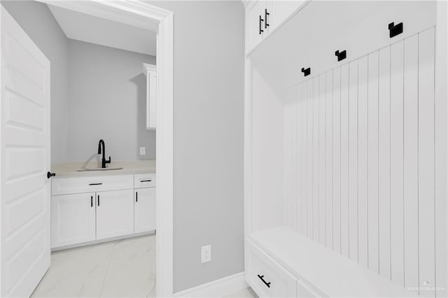 1915 Chandler Cir, Edinburg, TX 78542 - mudroom featuring a sink and light marble finish flooring