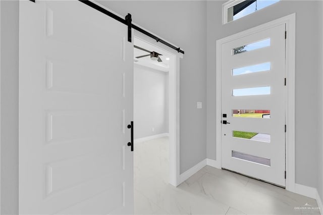 1915 Chandler Cir, Edinburg, TX 78542 - entrance foyer with a barn door and light marble finish flooring
