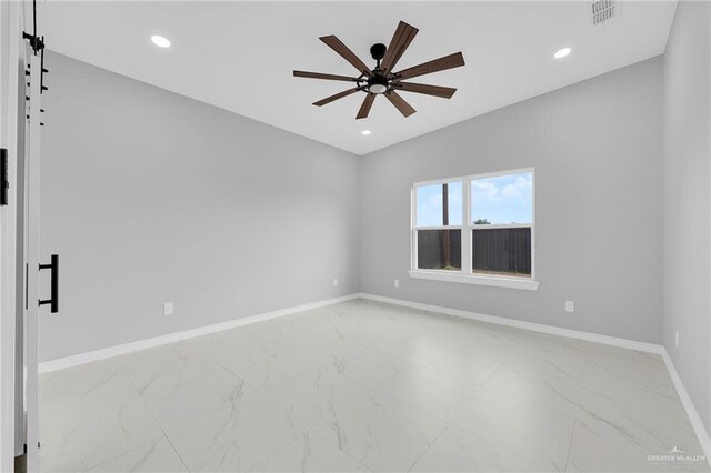 1915 Chandler Cir, Edinburg, TX 78542 - empty room with light marble finish flooring, ceiling fan, and recessed lighting