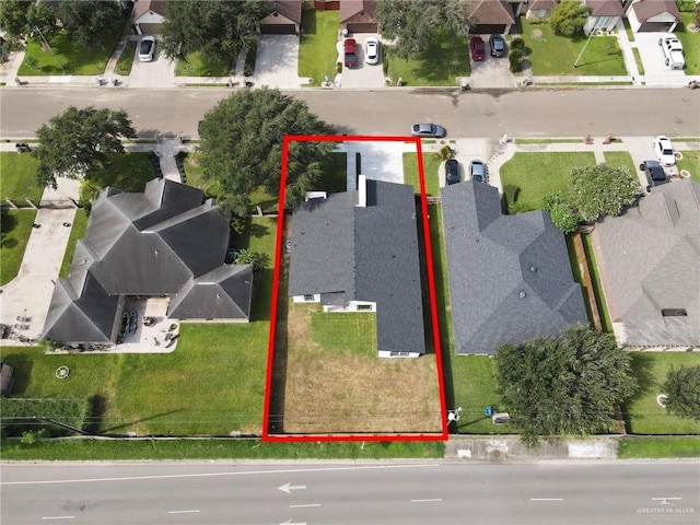1915 Chandler Cir, Edinburg, TX 78542 - aerial perspective of suburban area with property parcel outlined