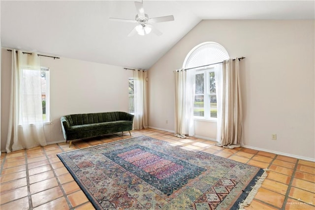 sitting room featuring vaulted ceiling, ceiling fan, and tile patterned floors